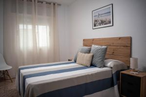 Llit o llits en una habitació de Alojamiento entero, a diez minutos de La Judería
