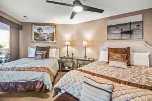 Postel nebo postele na pokoji v ubytování Shorehaven II - C2 + 14 fotografií