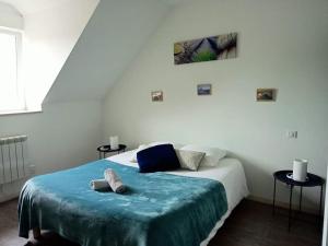 Postel nebo postele na pokoji v ubytování Relais de Moidrey