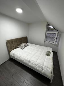 Tempat tidur dalam kamar di Vila Bate Bole