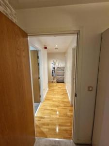 an empty hallway with a horse in a room at Amazing flat in the heart of Manchester city centre! in Manchester
