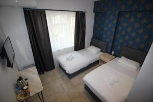 Postel nebo postele na pokoji v ubytování Safir Hotels Çorlu