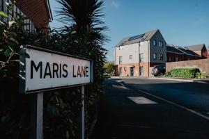 a sign that says mars lane on the side of a street at Central, Large 4 double bedroom house in Leicester