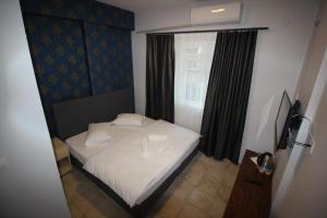 Postel nebo postele na pokoji v ubytování Safir Hotels Çorlu