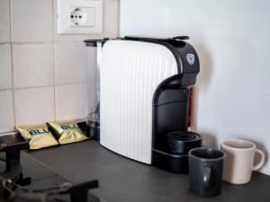 a black and white appliance sitting on top of a counter at Bianco e Nero in Casale sul Sile