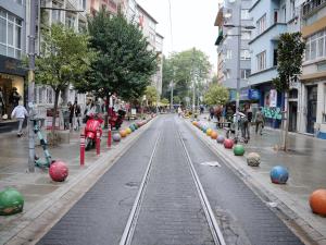 a city street with a toy train track on the street at Kadıköy Duck hotel in Istanbul