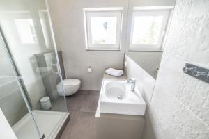 Um banheiro em Silver One Apartments