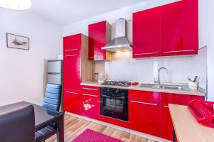 Kuchyň nebo kuchyňský kout v ubytování Apartment Miro