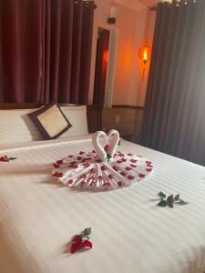 Postel nebo postele na pokoji v ubytování Hoa My II Hotel