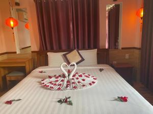 Postel nebo postele na pokoji v ubytování Hoa My II Hotel
