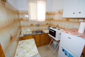 מטבח או מטבחון ב-Valkaniotis Apartments