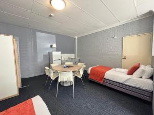 Postel nebo postele na pokoji v ubytování Princes Lodge Motel