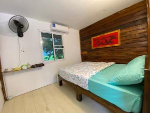 Katil atau katil-katil dalam bilik di Khunkorn Fishing Farm Stay