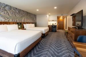Hotel Canoe and Suites客房内的一张或多张床位