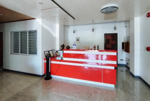 a store with a red counter in a room at RedDoorz @ LQJ Hotel Old Buswang Kalibo in Kalibo