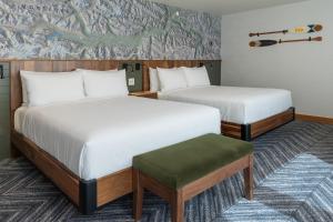 Hotel Canoe and Suites客房内的一张或多张床位