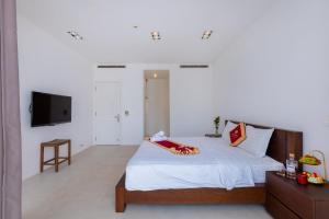 TV a/nebo společenská místnost v ubytování Sát Biển D6