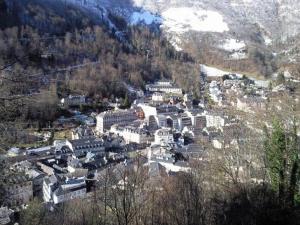 an aerial view of a town in the mountains at Appartement Cauterets, 3 pièces, 4 personnes - FR-1-234-296 in Cauterets