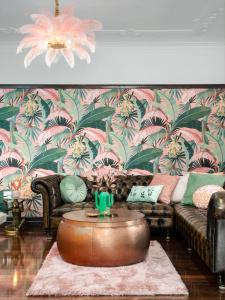 a living room with a couch and a coffee table at Anville Court in Brisbane