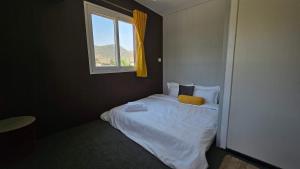 Ένα ή περισσότερα κρεβάτια σε δωμάτιο στο White Lotus Villa +7 φωτογραφίες