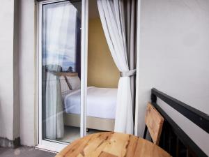 Postel nebo postele na pokoji v ubytování RAP Hotel Balige