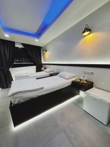 En eller flere senge i et værelse på Kadıköy Duck hotel
