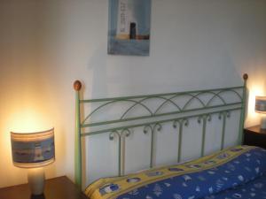 Llit o llits en una habitació de Villa Pina