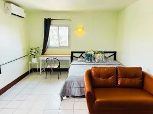 Ένα ή περισσότερα κρεβάτια σε δωμάτιο στο K.L.Apartment