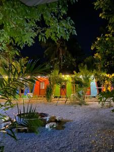 a group of tents are lit up at night at Homestay Hoa Núi in Cam Ranh