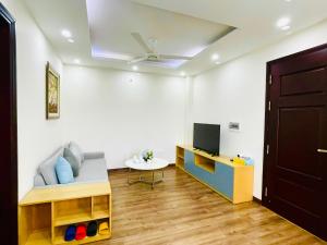 TV a/nebo společenská místnost v ubytování Hotel De La Seine