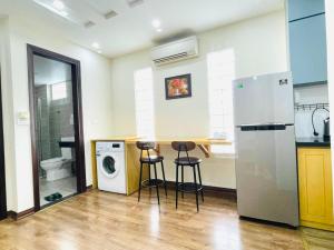 Kuchyň nebo kuchyňský kout v ubytování Hotel De La Seine