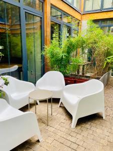 Κήπος έξω από το Magnifique LOFT Appartement Chalet Climatisé Buttes Chaumont +18 φωτογραφίες