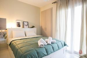 MOS luxury project by Homebrain tesisinde bir odada yatak veya yataklar