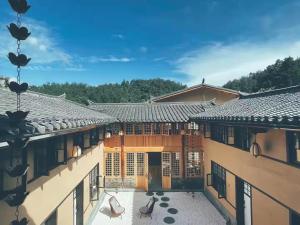 Balkón nebo terasa v ubytování Wudang Mountain Manju Manor