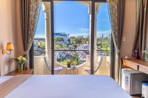 Postel nebo postele na pokoji v ubytování Guava Hill Boutique Hotel