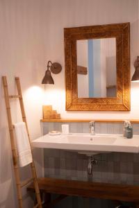 Ванная комната в Veranda Grand Baie Hotel & Spa