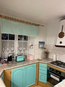 Kuchyňa alebo kuchynka v ubytovaní Apartmány Friday