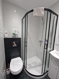 Kylpyhuone majoituspaikassa YourSecondFlat Sobieski Apartment
