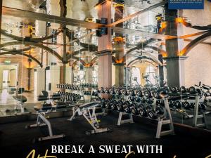 a large room with rows of chairs in a gym at Pattaya Grand florida Beach 36 in Na Jomtien