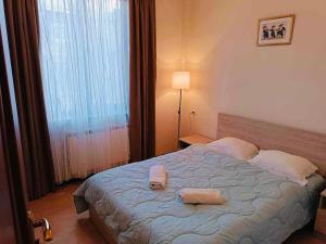Letto o letti in una camera di Republic Square Apartment