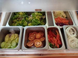 a refrigerator filled with different types of vegetables at The Spa Koh Chang Resort in Ko Chang