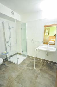 Koupelna v ubytování Hotel Trzy Światy Spa & Wellness Rajska WySpa