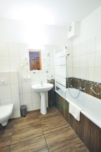 Koupelna v ubytování Hotel Trzy Światy Spa & Wellness Rajska WySpa