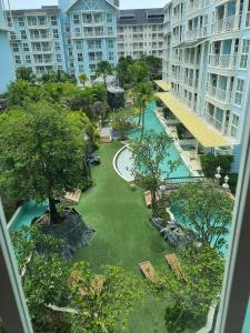 an aerial view of a courtyard in a large building at Pattaya Grand florida Beach 36 in Na Jomtien