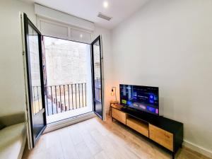 Μια τηλεόραση ή/και κέντρο ψυχαγωγίας στο Pilar Dreams ComoTuCasa