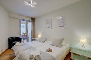 Posteľ alebo postele v izbe v ubytovaní Au Vieux Port Cannes City Center - Happy Rentals