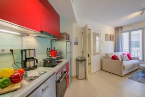 Kuchyňa alebo kuchynka v ubytovaní Au Vieux Port Cannes City Center - Happy Rentals