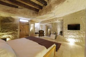 TV a/nebo společenská místnost v ubytování My Cave Suites