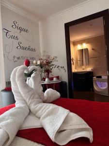 Ein Bett oder Betten in einem Zimmer der Unterkunft Casa Blanco Conde