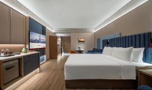 Voodi või voodid majutusasutuse Intercity Shenzhen Futian Huanggang with Free Mini Bar toas